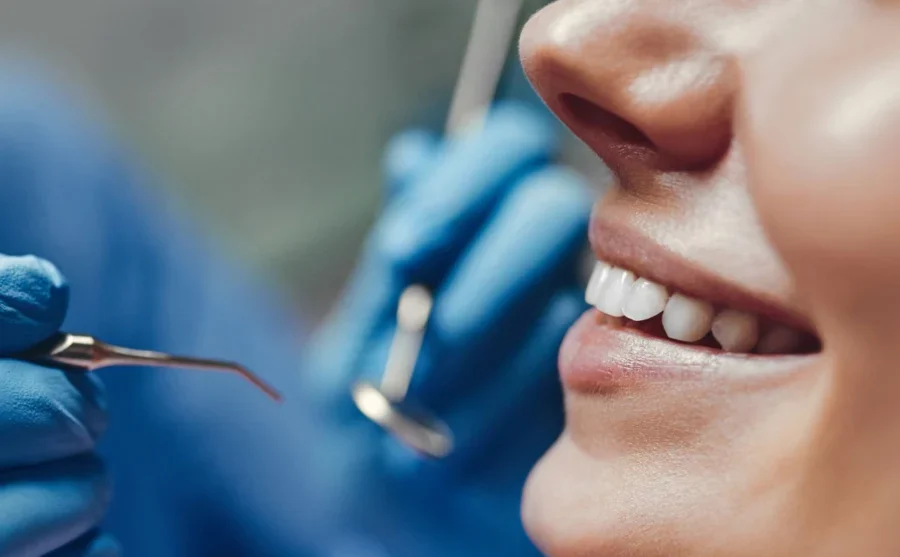 Woman Smiling At Dentist