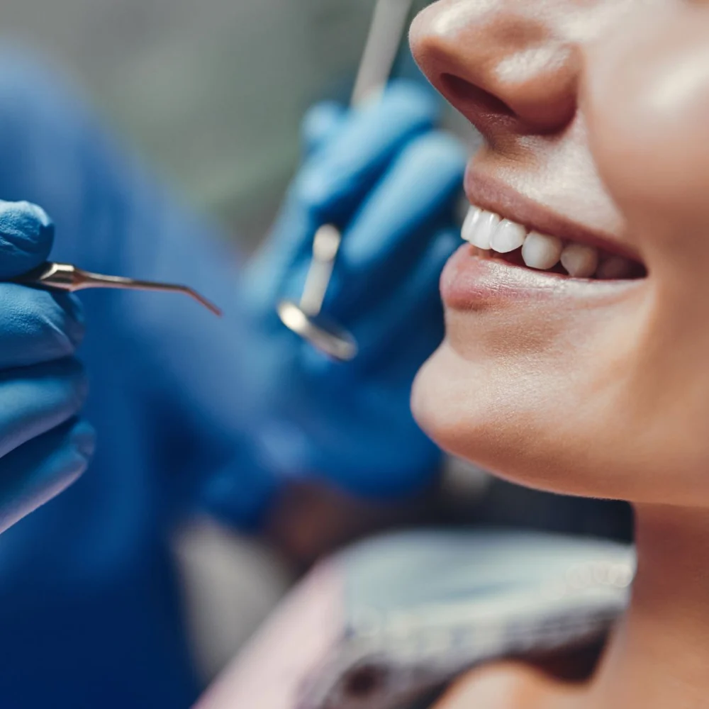 Woman Smiling At Dentist